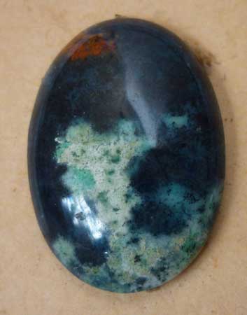 Highly polished Chrysocolla cab from Indonesia