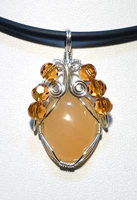 Wire wrap pendant with Yellow Calcite from Indonesia
